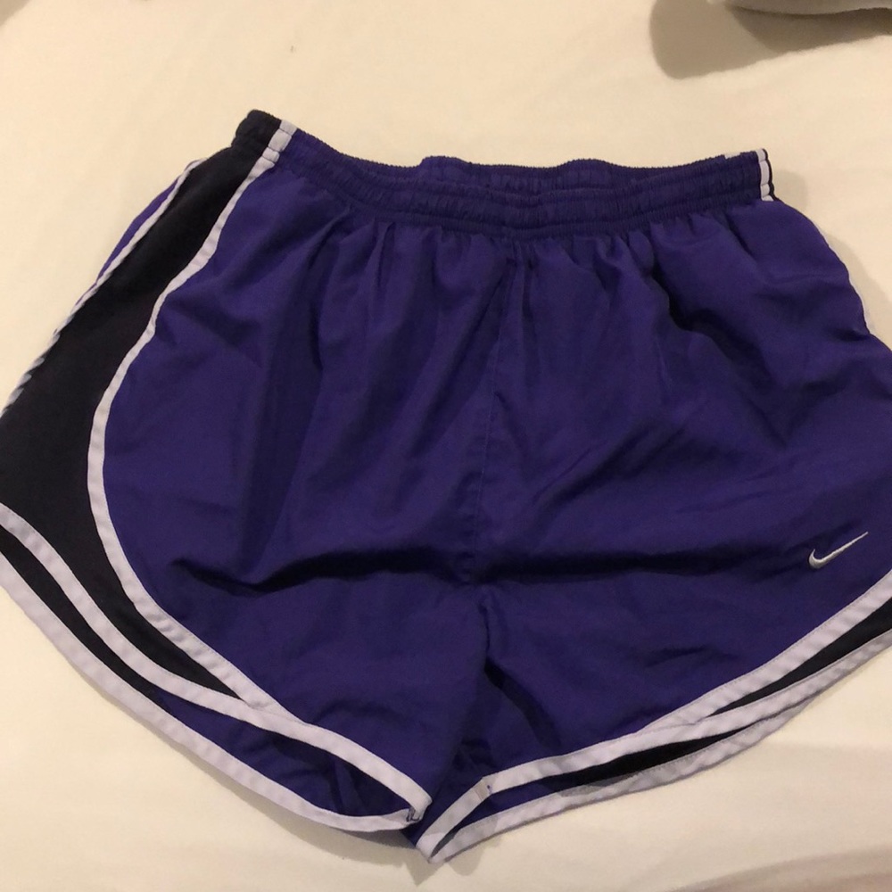 Purple Nike shorts